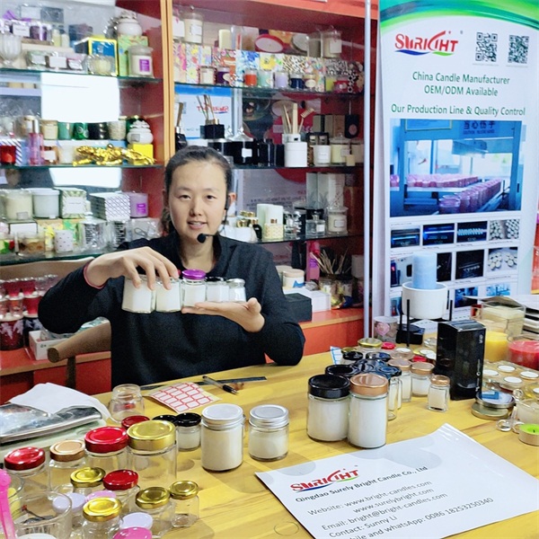 How did Surely Bright Candle Company show candles in 128th Canton Fair in 2020?